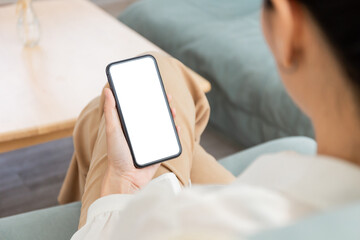 cell phone blank white screen mockup.woman hand holding texting using mobile on desk at office.background empty space for advertise.work people contact marketing business,technology