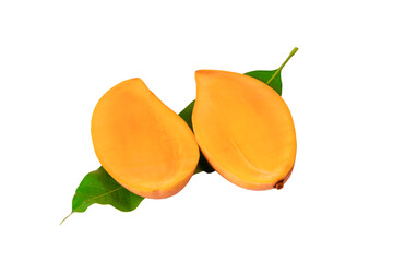 Half slice of yellow mango on the leaf