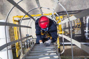 male climb the ladder tank