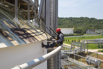 Male worker rope access  inspection