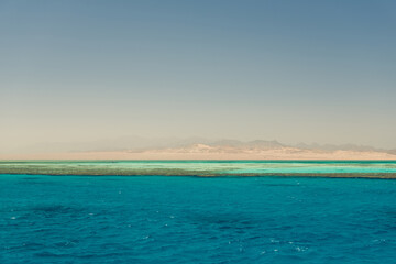 red sea coastline landscape with Egypt mountains on background