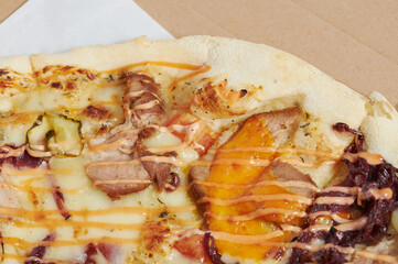 Slice of pizza with ham