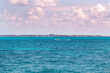 Cancun view from Isla Mujeres with the ocean in between.