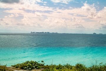 Cancun view from Isla Mujeres with the ocean in between.