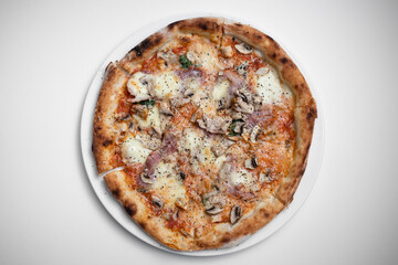 top view of italian pizza with ham, mushrooms and cheese on white background