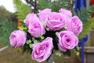 Wedding flowers in different shades of pink and red, roses.