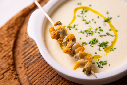 Cream of asparagus with cockles. Traditional tapas starter from southern Spain.