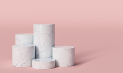 cylindrical pedestals in white marble