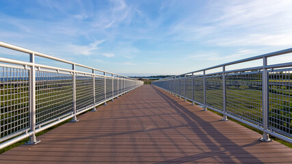 Fototapeta na wymiar low angle view of boardwalk overlooking nature preserve