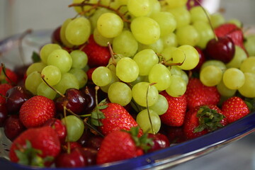 Fruit grapes strawberry table setting