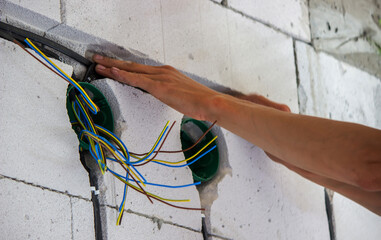 Electrical wiring in the house. Electric cable laying.
