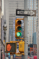 MANHATTAN, NEW YORK - MAY 7, 2014: Sign and traffic lights in th