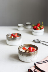 Strawberry, cream cheese and feta cream and crumble crust dessert. Homemade Sweet and salty cheesecake. Trifle. Selective focus