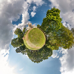 tiny planet with road in blue sky with beautiful clouds. Transformation of spherical panorama 360...