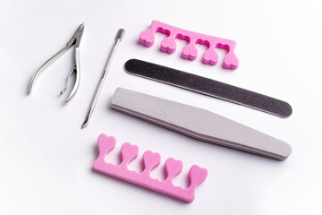 Manicure and pedicure tools on a white background