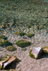 Clear water and stones at Königssee in Bavaria, Germany