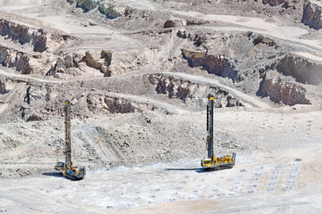 Blasthole drill in an open pit copper mine operation in Chile