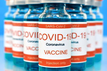 Glass ampoules with Covid-19 vaccine.
