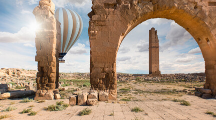 Hot air balloon flying over spectacular Mesopotamia - Ruins of the ancient city of Harran - Urfa,...