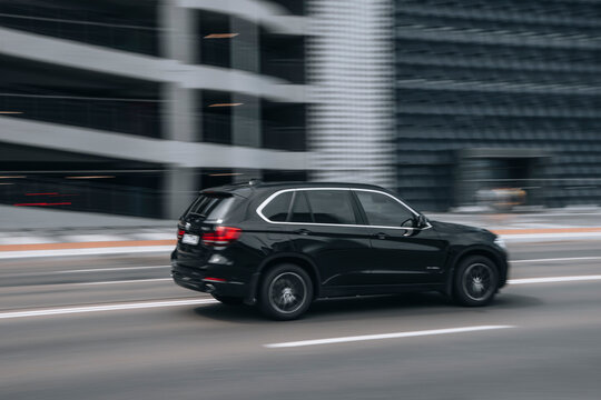 Ukraine, Kyiv - 27 June 2021: Black BMW X5 car moving on the street. Editorial