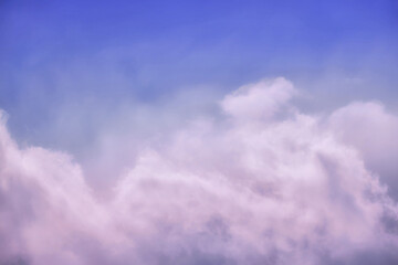 Misty clouds in a blue sky, copy space for text