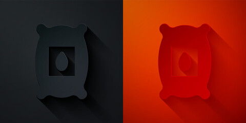 Paper cut Pack full of seeds of a specific plant icon isolated on black and red background. Paper art style. Vector