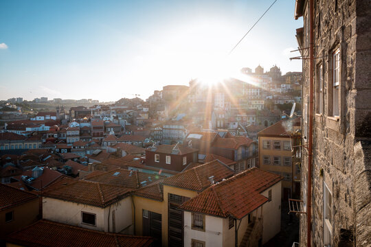 Old city of Porto with sun flare