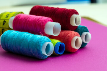 Coils with threads of different colors lie slide