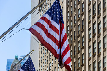 Cityscape Manhattan architecture building with tourist scene Flag of America over New York