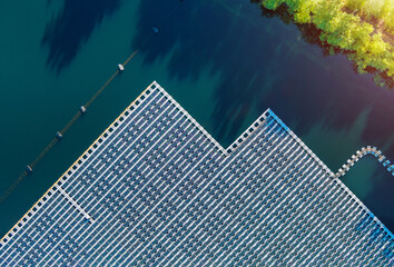 Panorama aerial view of floating solar panels cell platform on the beautiful lake renewable alternative electricity energy