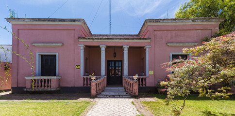 Fototapeta na wymiar Old pink house in San Antonio de Areco, Buenos Aires Province, Argentina