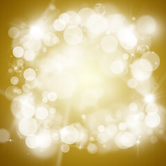 Gold sparkle rays glitter lights with bokeh elegant abstract background. Dust sparks background.