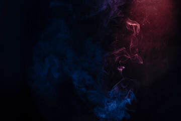 Blue and pink steam on a black background.