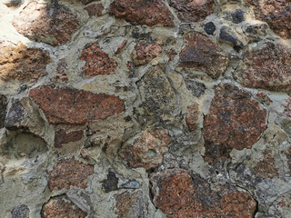 The outer stone wall of the Vyborg Castle in the city of Vyborg