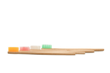Bamboo toothbrush isolated on a white background.