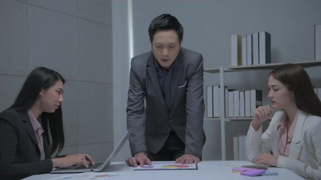 Business concept of 4k Resolution. Asian employees discussing in a meeting room.