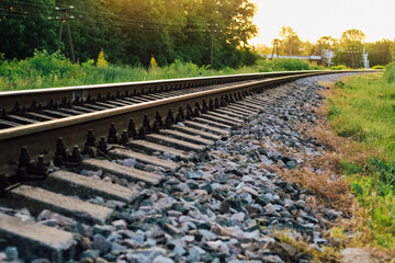 The railway going into the distance. Iron empty long rails.