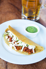 Mexican quesadillas with corn tortillas. Traditional Mexican food. Mexican food on wooden background. Mexican traditional food concept