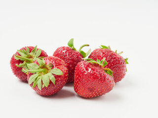 Fresh, red and tasty strawberries isolated on a white background