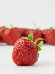 Fresh, red and tasty strawberries isolated on a white background