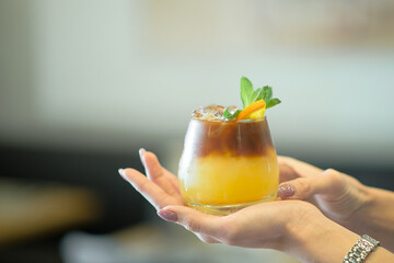 A cocktail of their espresso and orange juice