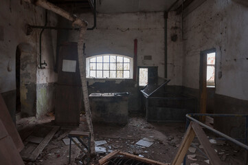 Fototapeta na wymiar Machinery in an old abandoned distillery
