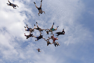 Skydiving. Half-naked skydivers are falling in the sky.