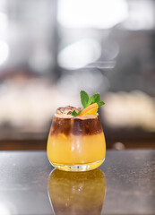 A cocktail of their espresso and orange juice