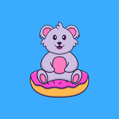 Cute koala is sitting on donuts. Animal cartoon concept isolated. Can used for t-shirt, greeting card, invitation card or mascot. Flat Cartoon Style