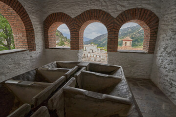 Fototapeta na wymiar Laundry in Pampaneira. Town located in the Alpujarra region, in the province of Granada