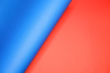 Obraz premium Blue cardboard on a red background.