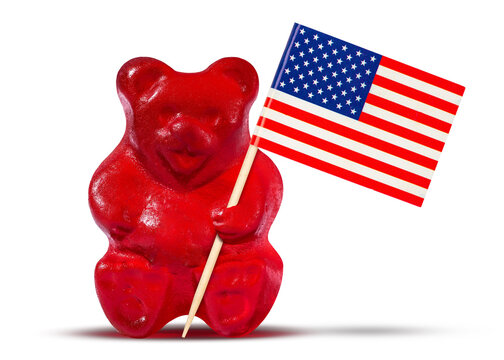 Gummy bear with American Flag. Red jelly gummy bears. Sweet gelatin candy. 4th of July, Independence, Presidents Day. Patriotic US Holidays. Macro high resolution food photo. Isolated white background