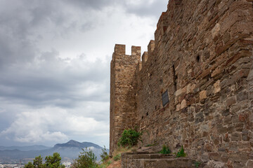 Fototapeta premium A medieval fortress. View of the old stone fortress. The fortress wall.