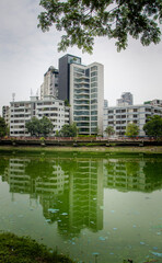 Fototapeta na wymiar Buildings over the lake | Lakeside Apartment